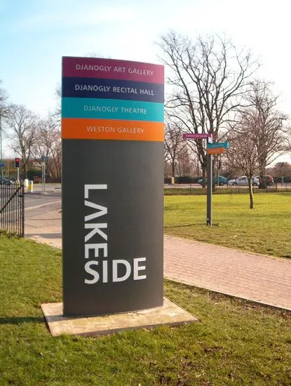 Bilingual Arabic English directional sign