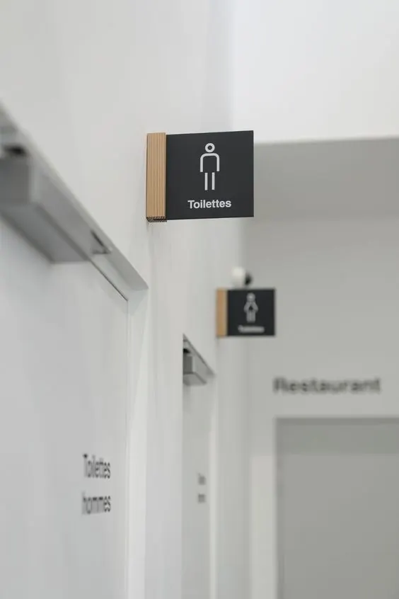 Blade wayfinding sign installation